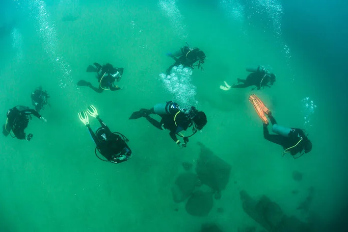 A group of scuba divers completing their Advanced Open Water Course
