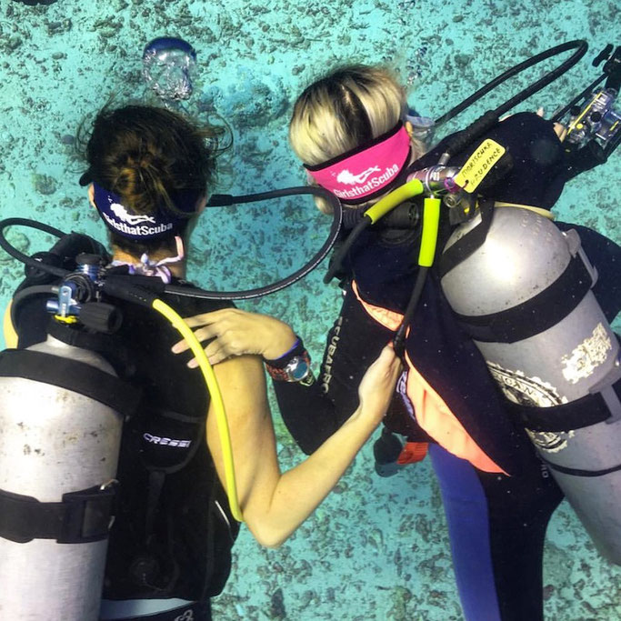 A great way to find a buddy is to look out for the Girls that Scuba mask strap