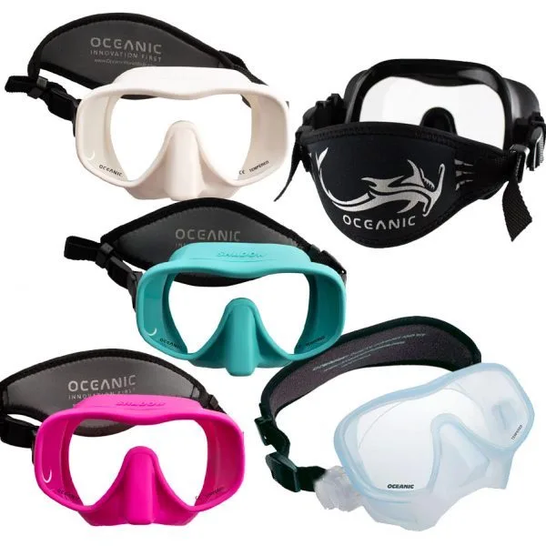 Oceanic Shadow scuba diving mask in white, black, turquoise, pink, and clear