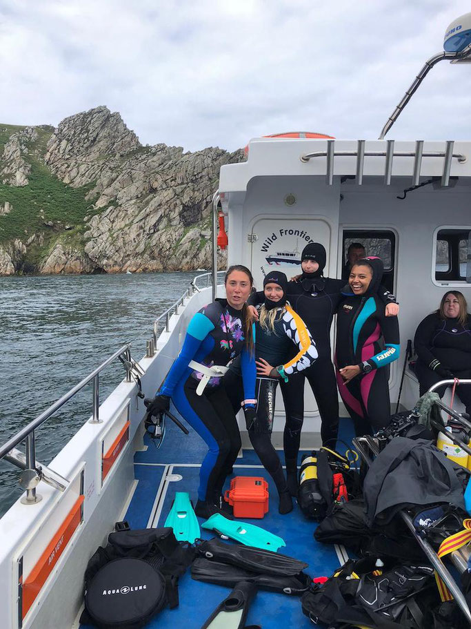 Girls that Scuba wrapping up for a cold but FUN day at Lundy Island
