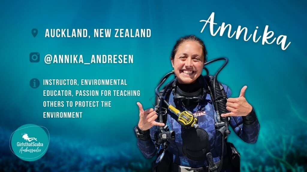 Annika Andresen Girls that Scuba Ambassador standing smiling at camera wearing scuba gear, overlaid white text summarises her profile below