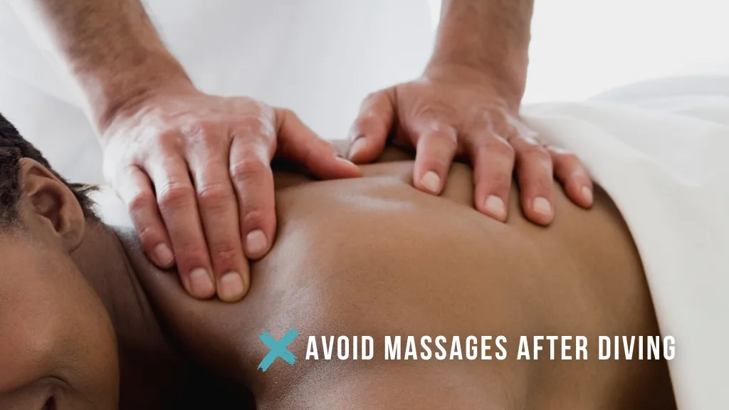 Close up of a black woman's back being massaged by two hands. Overlaid white text reads "avoid massages after diving", with a teal cross symbol. 