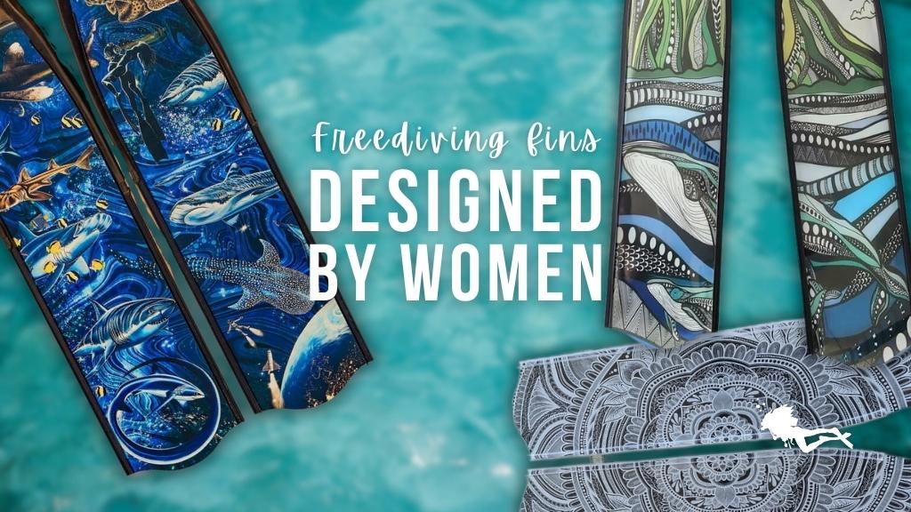Three pairs of artistic freediving fins laid over a blurred turquoise ocean background, white text reads "freediving fins designed by women".