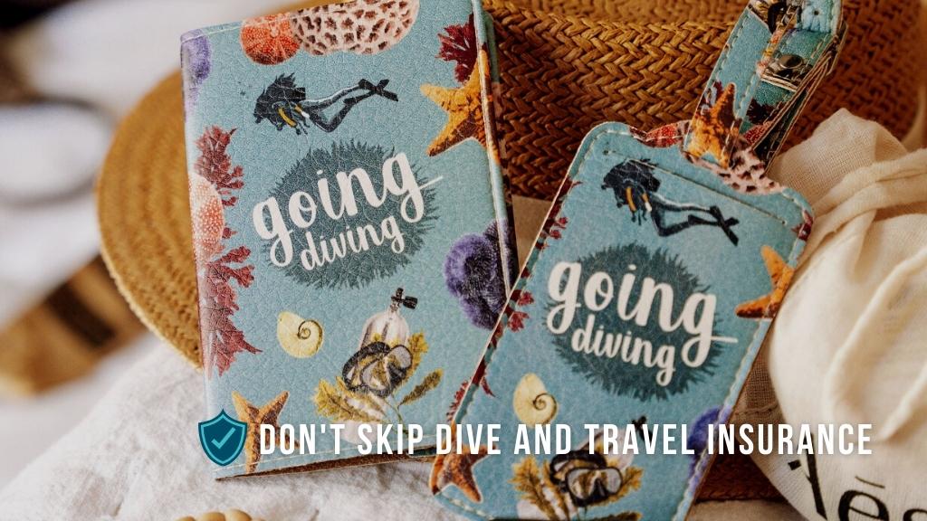 A turquoise passport cover with "going diving" white text and matching luggage tag lean against a straw hat. Overlaid white text reads "don't skip dive and travel insurance".