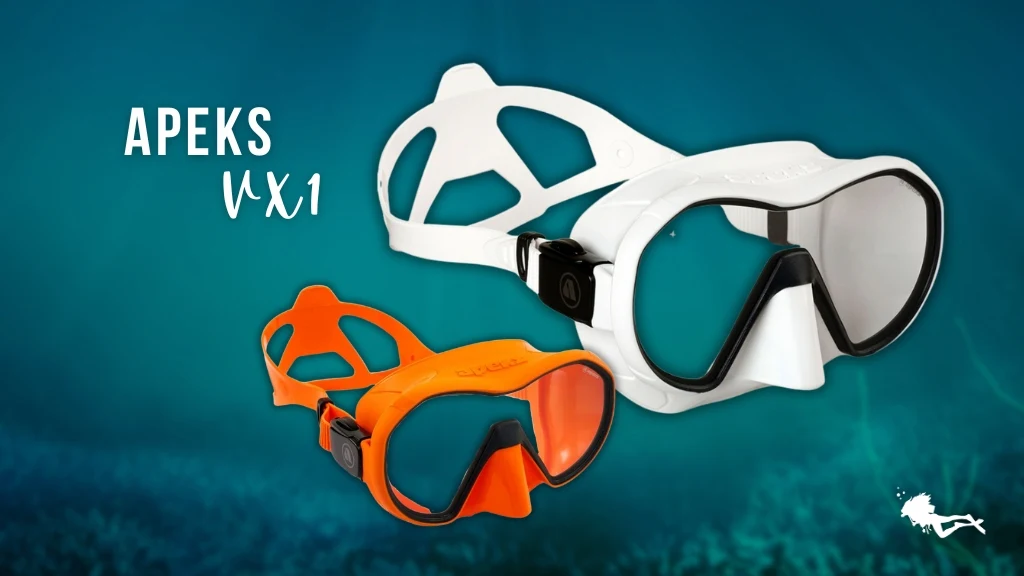 Apeks VX1 women's scuba masks in white and orange against a blurred ocean background. 
