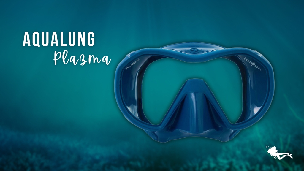 An Aqualung Plazma women's scuba mask in dark blue against a blurred ocean background. 