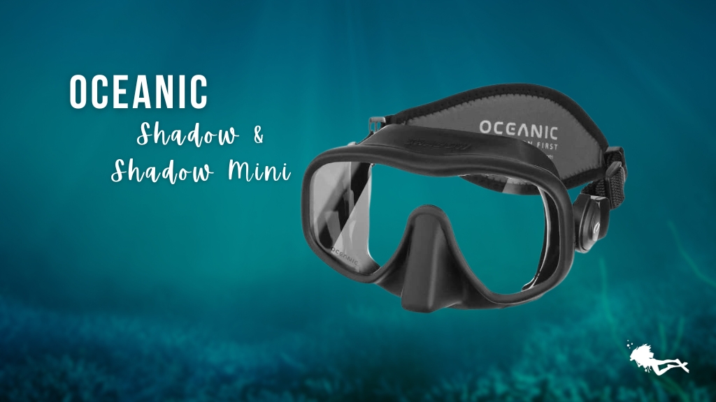 Oceanic Shadow women's scuba mask in black against a blurred ocean background. 