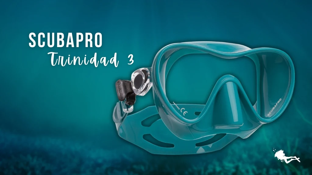 A Scubapro Trinidad 3 women's scuba mask in teal against a blurred ocean background. 